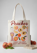 Tote bag blanca con estampado de melocotones, vista frontal sobre fondo neutro
